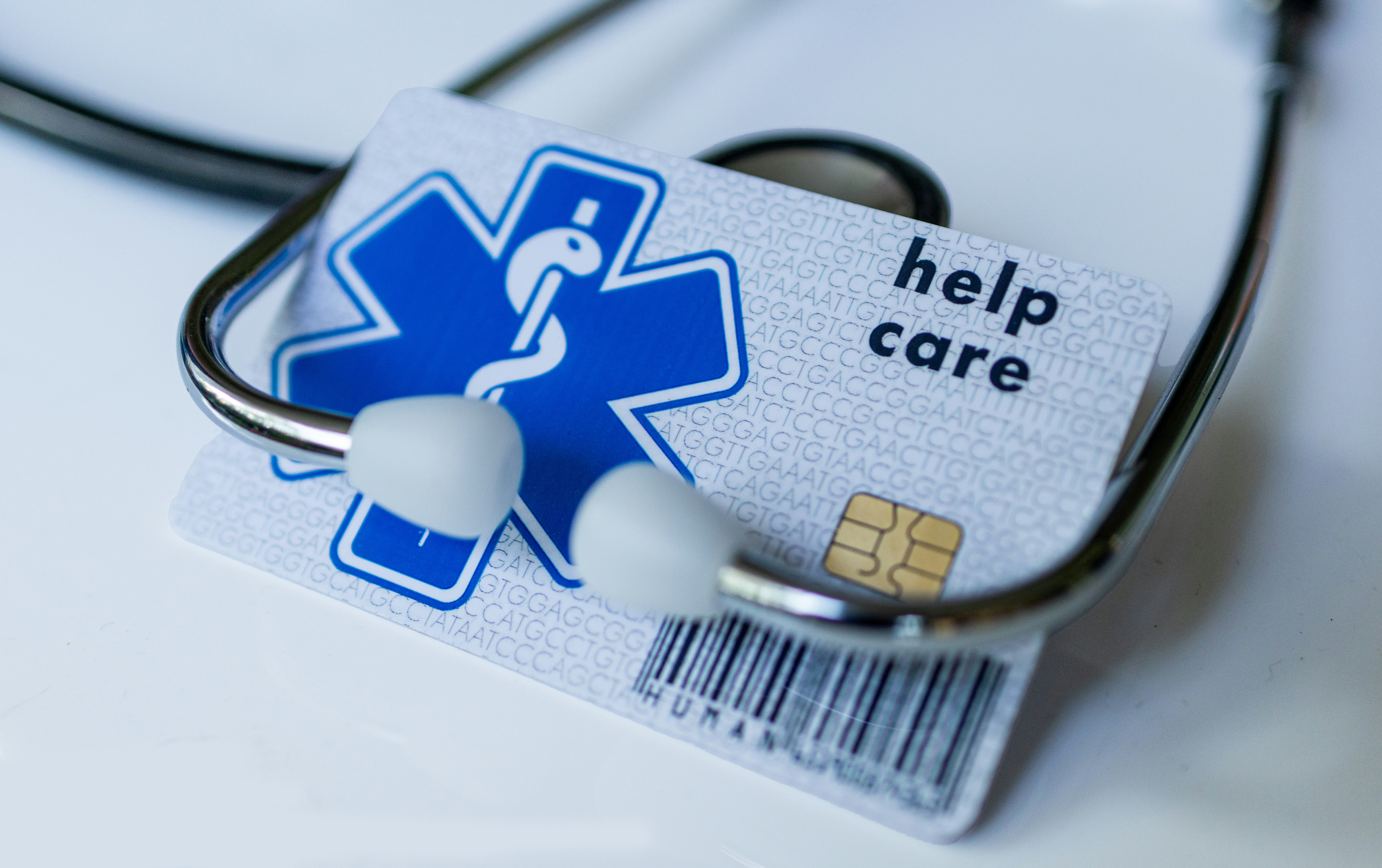 a health card and a stethoscope